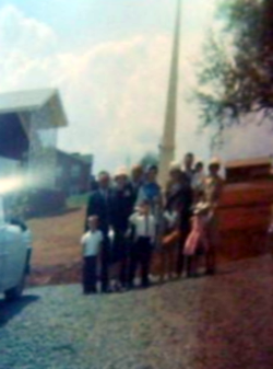 People outside of old building